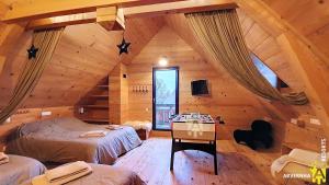 Postel nebo postele na pokoji v ubytování La Belle Etoile