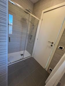 a shower with a glass door in a bathroom at Il Rifugio in Sulmona +28 photos