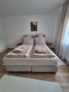 Postel nebo postele na pokoji v ubytování Pfälzer Wald Apartment