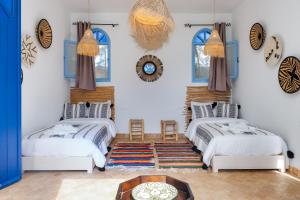 Ένα ή περισσότερα κρεβάτια σε δωμάτιο στο Dar Yanis +182 φωτογραφίες