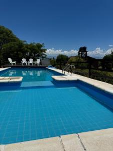 Swimmingpoolen hos eller tæt på Cabañas El Atalaya