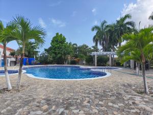 Bazén v ubytování Glamping Tesoro Escondido nebo v jeho okolí