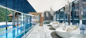 The swimming pool at or close to Alpin Life Resort Lürzerhof