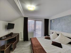 Et tv og/eller underholdning på Pensiunea Beatrice