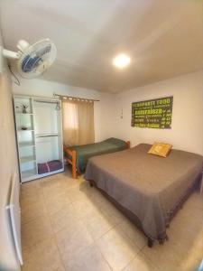 Giường trong phòng chung tại Lugar Sagrado Hostel