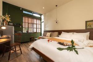 En eller flere senge i et værelse på PIN Trương Quyền