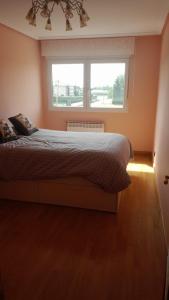 En eller flere senge i et værelse på El refugio de Sam + 6 billeder