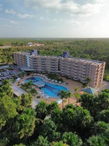 an aerial view of a resort with a swimming pool at Apto Luxo Gran Lençóis Atins 503 in Barreirinhas