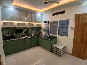 Kuchyň nebo kuchyňský kout v ubytování ShivAOM Family Homestay