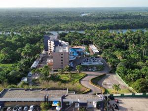 an aerial view of a building with a parking lot at Apto Luxo Gran Lençóis Atins 503 in Barreirinhas