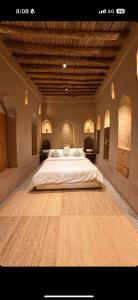 Ένα ή περισσότερα κρεβάτια σε δωμάτιο στο Muskad