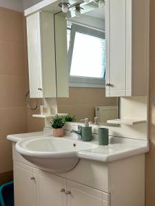 Koupelna v ubytování Easy Stay Airport Athens