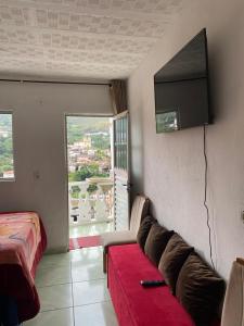 Et tv og/eller underholdning på Kitnet aconchegante