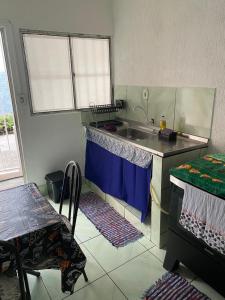 Køkken eller tekøkken på Kitnet aconchegante