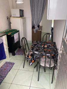 Køkken eller tekøkken på Kitnet aconchegante + 5 billeder