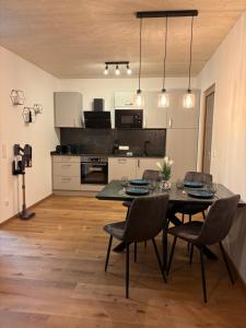 Kuchyň nebo kuchyňský kout v ubytování Appartement Fellsattler