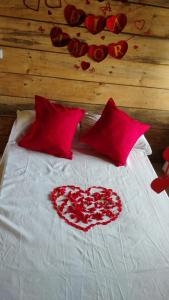 En eller flere senge i et værelse på El Ventanal Al Cielo