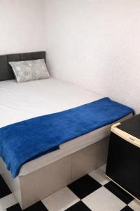 En eller flere senge i et værelse på Peró Beach Hospedaria