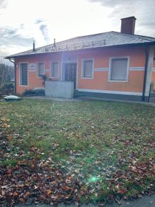 a house with a pile of leaves in front of it at App in Gillersdorf +2 photos