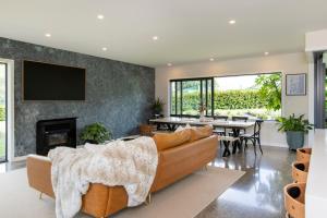 Et opholdsområde på Spacious 5 Bed Home 2 Mins to Beach