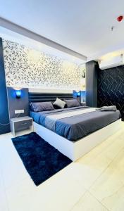 Giường trong phòng chung tại Amaatra suits