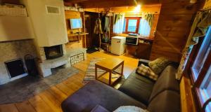 an overhead view of a living room with a couch and a fireplace at Laulu Harmony house in Laulasmaa