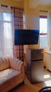 TV/trung tâm giải trí tại Maggie suites