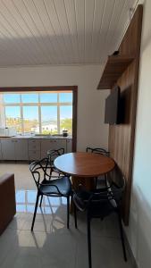 Et tv og/eller underholdning på Flamingo Pé na areia - Centro/Guaratuba