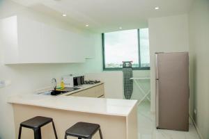 Køkken eller tekøkken på Résidence Hôtel Missikewa Cocody-Angré + 8 billeder