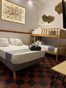 Giường trong phòng chung tại Casa Zaguan +10 ảnh