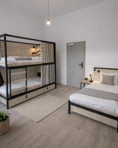 Postel nebo postele na pokoji v ubytování Berlin Sleep Club