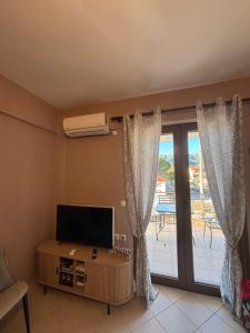 TV/trung tâm giải trí tại Kalavryta Moments