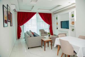 Et tv og/eller underholdning på Résidence Hôtel Missikewa Cocody-Angré