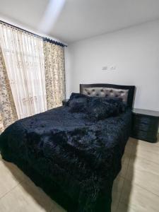 En eller flere senge i et værelse på Castelar Luxury Apartment Ipiales + 24 billeder