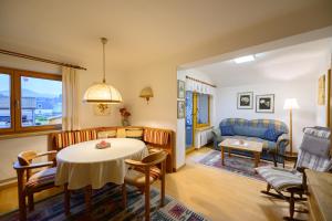 Postel nebo postele na pokoji v ubytování Ferienwohnungen Margreiter