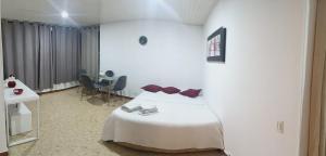 En eller flere senge i et værelse på Atlantis