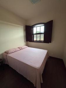 Postel nebo postele na pokoji v ubytování Morada Alecrim