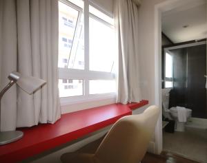 Vannituba majutusasutuses Ez Aclimação Hotel
