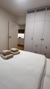 Postel nebo postele na pokoji v ubytování VApartment Nova Vajnorska , private parking