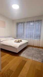 Postel nebo postele na pokoji v ubytování VApartment Nova Vajnorska , private parking