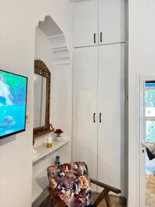 TV/trung tâm giải trí tại Marsa Cocon Cozy Studio in La Marsa Beach