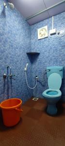 Koupelna v ubytování Srujana Beach Homestay + 33 fotografií