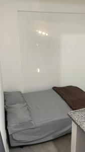 Postel nebo postele na pokoji v ubytování Flat 2 ao lado da UFSJ e Igreja São Francisco