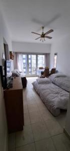 En eller flere senge i et værelse på Retro Style + 5 billeder