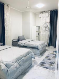 En eller flere senge i et værelse på Diamond Guest House K