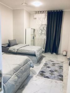 En eller flere senge i et værelse på Diamond Guest House K