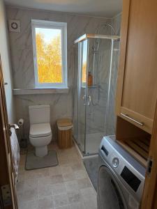 Phòng tắm tại Cozy Stay