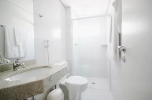 Vannituba majutusasutuses Ez Aclimação Hotel