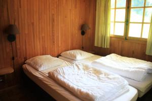 En eller flere senge i et værelse på Appartements à Châtel - Chalet Marpoêt MRP NATURE & QUIET 6 Pers. MAE-1581