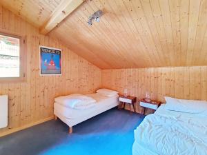 En eller flere senge i et værelse på Chalets à Châtel - Chalet Casimir CSM CHARMING & NATURE 10 Pers. MAE-3393